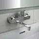 Wand-Waschtischarmatur in Chrom-Design von Ideal Standard, montiert an einer Fliesenwand, mit Auslauf über einem weißen Waschbecken.